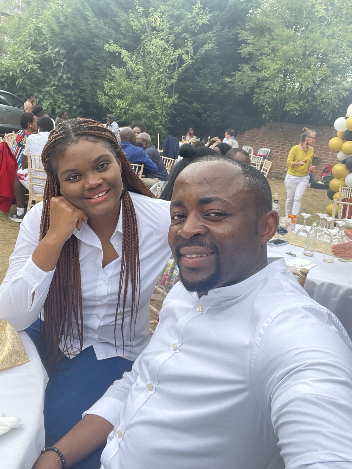 Ines and Billy at an outdoor celebration